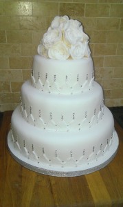 Ellena 3 Tier Cake topped with hand-made sugar roses